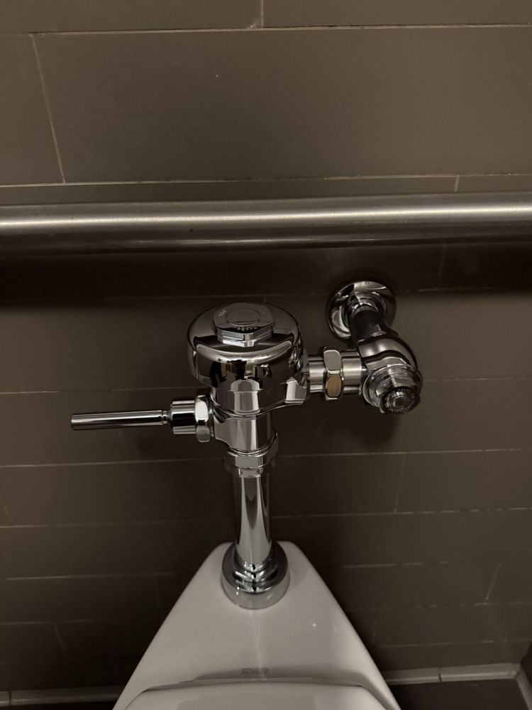Commercial restroom flush valve repair