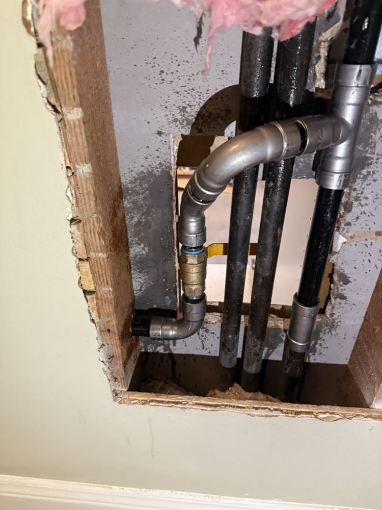 PEX repiping installed behind a wall during a New York City water damage restoration job